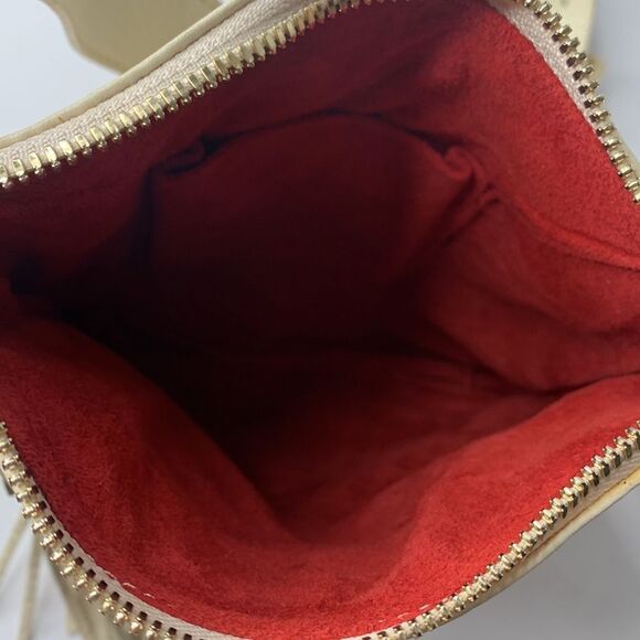 Kelly Tooke cream leather tasseled charm keychain crossbody bag - Picture 9 of 10